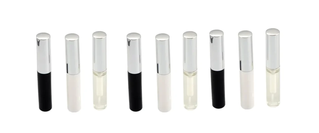 Different lash adhesive package formats including tubes and bottles