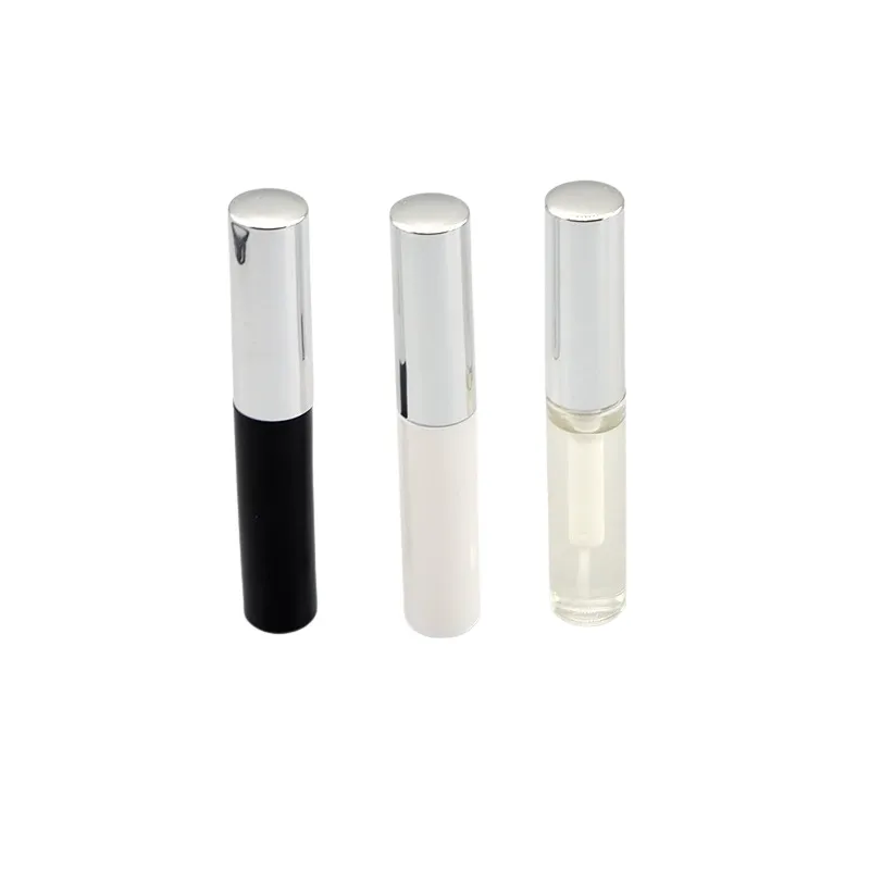 Three lash adhesive tubes in black, white, and clear packaging